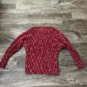 Maurice’s red sweater